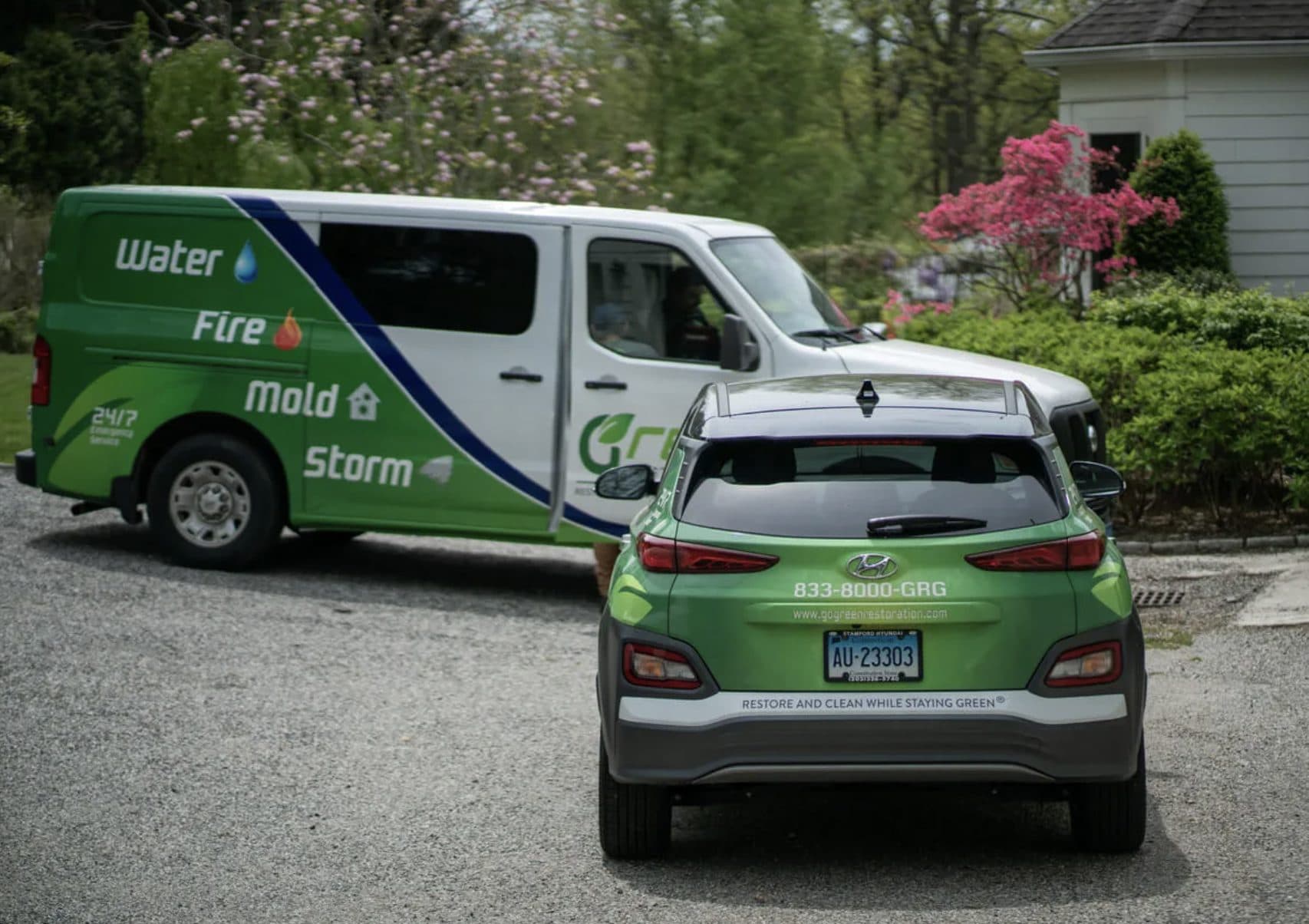 Green Restoration branded vehicles